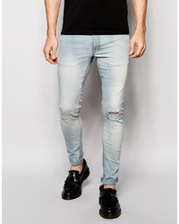 Asos Brand Extreme Super Skinny Jeans In Bleach Wash With Knee Rips