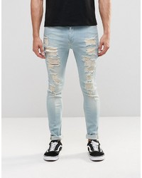 Asos Brand Super Skinny Jeans With Extreme Rips In Mid Wash Blue