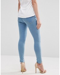 Asos Petite Petite Lisbon Skinny Mid Rise Jeans In Honey Light Wash With Stepped Raw Hem