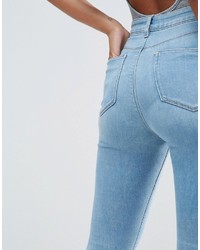 Asos Ridley Skinny Jeans In Felix Mid Stonewash With Busted Knees And Chewed Hems