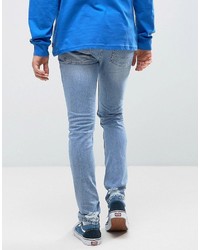 Asos Skinny Jeans In Light Wash Blue Vintage With Heavy Rips