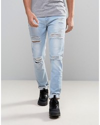 Asos Skinny Jeans With Heavy Rips In Bleach Wash Blue