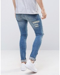 Asos Super Skinny Jeans In 125oz With Mega Rips In Light Blue