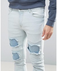 Asos Super Skinny Jeans In Heavy Bleach With Mega Rip Repair