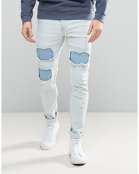 Asos Super Skinny Jeans In Heavy Bleach With Mega Rip Repair