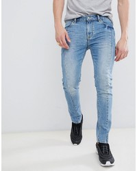 ASOS DESIGN Super Skinny Jeans In Mid Wash Blue With Cut And Sew