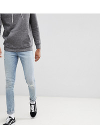 ASOS DESIGN Tall Super Skinny Jeans In Light Wash Blue With Abrasions