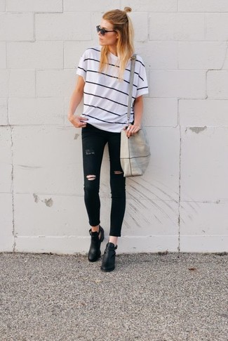 Black Ripped Skinny Jeans with Black Cutout Leather Ankle Boots Outfits: 