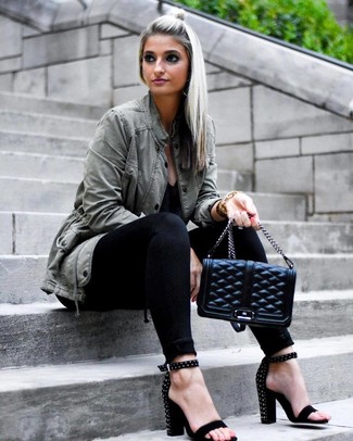 Olive Anorak Outfits For Women: Fashionable and comfortable, this combination of an olive anorak and black skinny jeans brings amazing styling possibilities. Black studded suede heeled sandals are the most effective way to add a confident kick to the outfit.