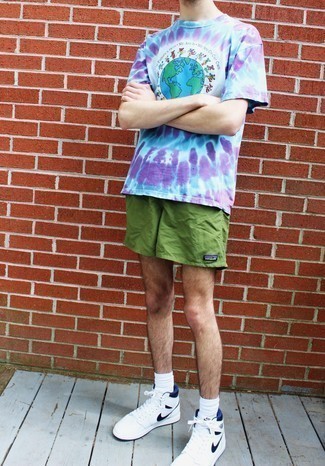 Dark Green Shorts Outfits For Men: An aquamarine tie-dye crew-neck t-shirt and dark green shorts are a wonderful outfit to integrate into your current casual rotation. If not sure as to what to wear when it comes to footwear, complement your outfit with white and black leather high top sneakers.