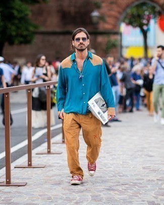 Blue Sunglasses Outfits For Men: Putting together an aquamarine long sleeve shirt with blue sunglasses is an on-point idea for a relaxed casual look. Here's how to bring an extra dose of class to this outfit: red canvas low top sneakers.