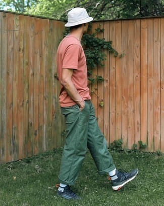 Men's White Bucket Hat, Charcoal Athletic Shoes, Dark Green Chinos, Pink Crew-neck T-shirt