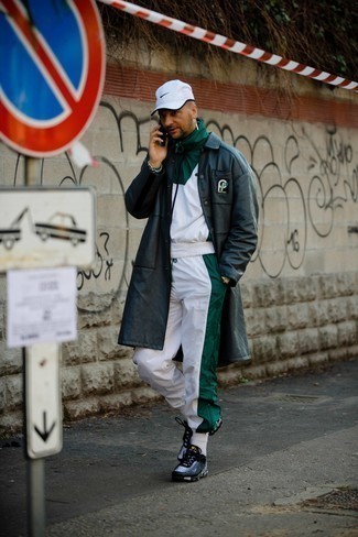 Men's White Baseball Cap, Black and White Athletic Shoes, White and Green Track Suit, Black Leather Overcoat