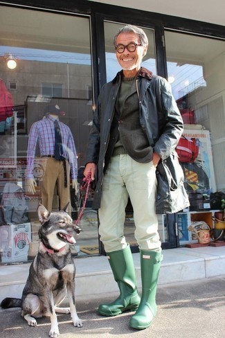 Olive Rain Boots Outfits For Men: Consider wearing a navy barn jacket and white chinos for both on-trend and easy-to-style ensemble. To add some extra zing to this look, complement your look with a pair of olive rain boots.