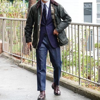 Olive Barn Jacket Outfits: We're loving how this combo of an olive barn jacket and navy dress pants immediately makes men look classy and sharp. Add a dash of stylish casualness to by finishing with a pair of burgundy leather casual boots.