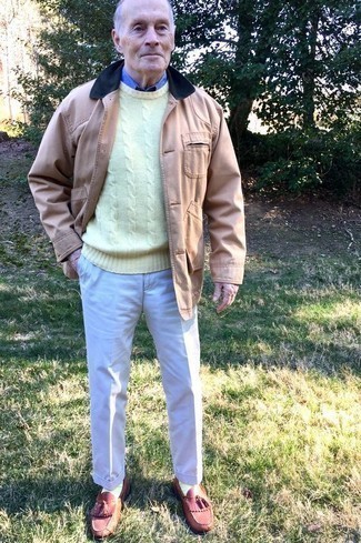 Yellow Cable Sweater Outfits For Men: You'll be amazed at how super easy it is to get dressed like this. Just a yellow cable sweater and beige dress pants. If not sure about what to wear on the shoe front, stick to burgundy leather tassel loafers.