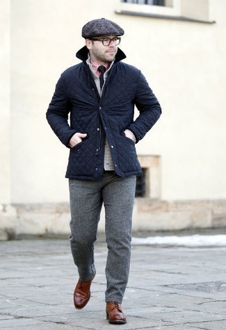 Flat Cap Outfits For Men: This bold casual pairing of a navy quilted barn jacket and a flat cap is very easy to pull together in no time flat, helping you look on-trend and prepared for anything without spending too much time searching through your wardrobe. A pair of brown leather brogue boots immediately bumps up the classy factor of any getup.