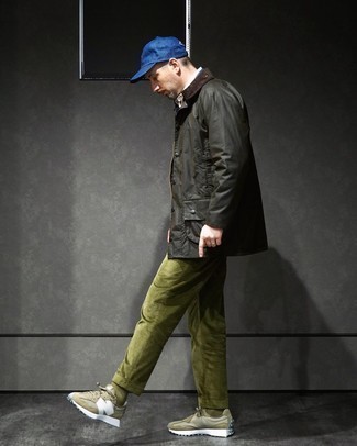 Baseball Cap Outfits For Men: For a casually cool look, dress in a dark green barn jacket and a baseball cap — these pieces play really well together. Complement this ensemble with olive athletic shoes for extra style points.