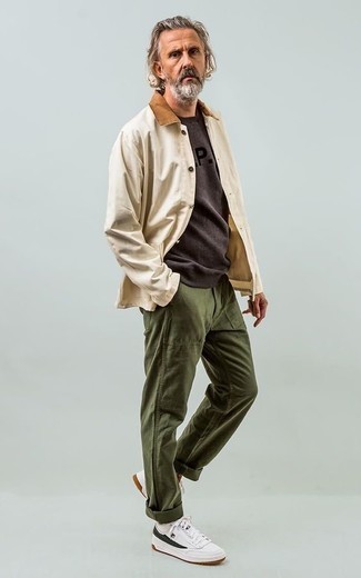 White and Green Leather Low Top Sneakers Outfits For Men: This relaxed casual pairing of a beige barn jacket and olive chinos can only be described as devastatingly sharp. Want to break out of the mold? Then why not complete your ensemble with a pair of white and green leather low top sneakers?