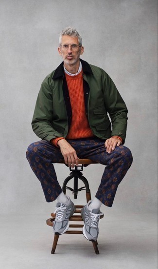 Orange Crew-neck Sweater Outfits For Men: Try pairing an orange crew-neck sweater with navy paisley chinos for a relaxed casual look with a twist. Want to tone it down when it comes to shoes? Add grey athletic shoes to the equation for the day.