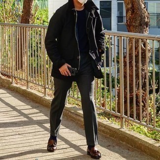 Charcoal Dress Pants Outfits For Men: Choose a black barn jacket and charcoal dress pants for a sleek refined menswear style. Brown leather tassel loafers are a good pick to finish this outfit.