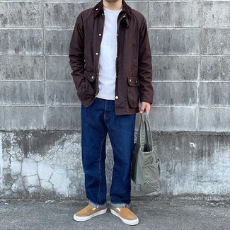 Tan Canvas Slip-on Sneakers Outfits For Men: For a laid-back ensemble, opt for a dark brown barn jacket and navy jeans — these two pieces go brilliantly together. When it comes to shoes, this getup is completed really well with tan canvas slip-on sneakers.