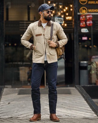 Grey Leather Watch Outfits For Men: This laid-back pairing of a beige barn jacket and a grey leather watch is very easy to throw together in no time, helping you look stylish and prepared for anything without spending a ton of time digging through your closet. Infuse this getup with an extra dose of refinement by slipping into brown leather chelsea boots.