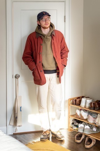 Tan Leather Snow Boots Outfits For Men: For a casual getup, dress in an orange barn jacket and white chinos — these pieces work really good together. For a more relaxed feel, introduce a pair of tan leather snow boots to the mix.