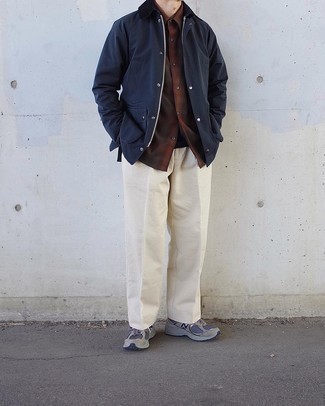 Beige Chinos Casual Outfits: For a laid-back and cool look, pair a navy barn jacket with beige chinos — these items work perfectly well together. Dial down the formality of this outfit with a pair of grey athletic shoes.