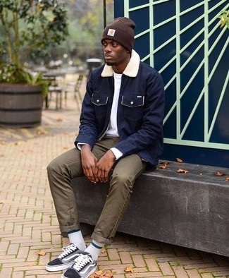 Dark Brown Beanie Outfits For Men: Consider wearing a navy barn jacket and a dark brown beanie if you're hunting for a look option that is all about relaxed casual style. Black canvas low top sneakers will create a beautiful contrast against the rest of the ensemble.