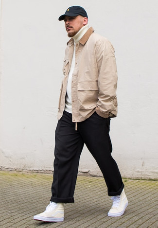 Barn Jacket Outfits: A barn jacket and black chinos are stylish menswear items, without which our closets would feel incomplete. For a more laid-back aesthetic, why not complete this ensemble with a pair of beige canvas high top sneakers?