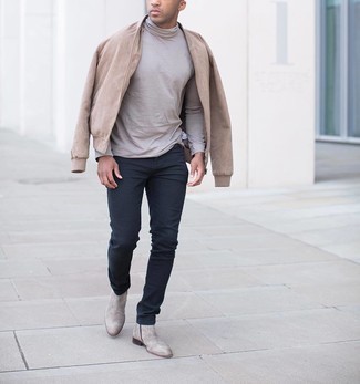 Beige Turtleneck Outfits For Men: You'll be amazed at how super easy it is for any man to throw together this laid-back ensemble. Just a beige turtleneck paired with black jeans. Add beige leather chelsea boots to the mix for an added touch of style.