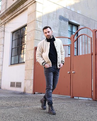 Men's Beige Textured Bomber Jacket, Black Turtleneck, Charcoal Ripped Skinny Jeans, Black Leather Casual Boots
