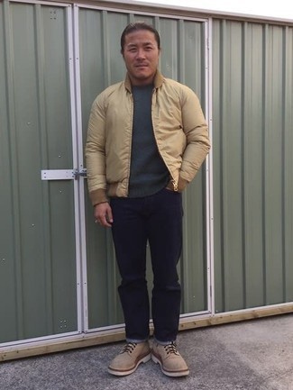 Tan Suede Casual Boots Outfits For Men: This pairing of a beige bomber jacket and navy jeans will allow you to demonstrate your prowess in men's fashion even on off-duty days. Add a pair of tan suede casual boots to this look for an instant style lift.