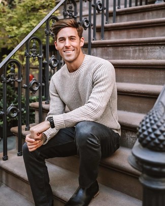 Tan Cable Sweater Outfits For Men: A tan cable sweater and black jeans are among the key elements in any modern gent's versatile casual collection. Introduce black leather chelsea boots to the equation to instantly change up the look.
