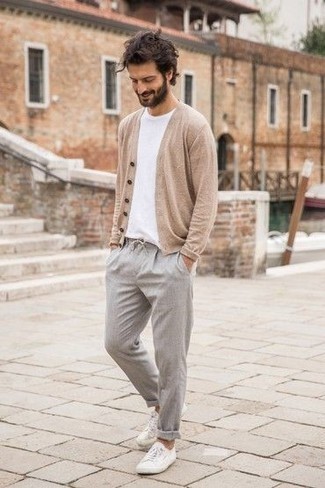 Beige Cardigan Outfits For Men: Try teaming a beige cardigan with grey chinos to exhibit your styling prowess. Let your outfit coordination expertise really shine by complementing this outfit with white canvas low top sneakers.