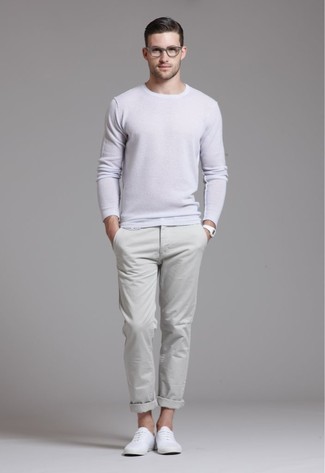 Beige Crew-neck Sweater Casual Outfits For Men: A beige crew-neck sweater looks so casually cool when married with beige chinos. The whole ensemble comes together wonderfully if you complement this look with white plimsolls.