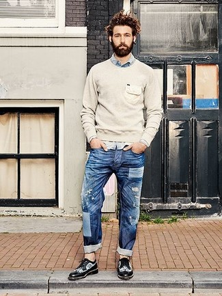 Light Blue Denim Shirt Outfits For Men: If you're all about comfort styling when it comes to fashion, you'll love this edgy combination of a light blue denim shirt and blue ripped jeans. Why not complement your look with a pair of black and white leather brogues for an extra touch of style?