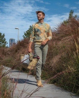 Green Chinos Outfits: For an outfit that delivers comfort and dapperness, opt for a beige tie-dye crew-neck sweater and green chinos. To bring out a polished side of you, introduce beige suede chelsea boots to the equation.