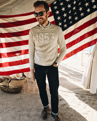 Beige Crew-neck Sweater Outfits For Men: The mix-and-match capabilities of a beige crew-neck sweater and navy jeans guarantee you'll always have them on high rotation in your wardrobe. Give a different twist to an otherwise too-common look by finishing with a pair of dark brown leather casual boots.