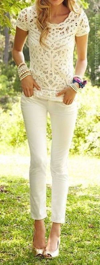 White Jeans Outfits For Women: A beige lace crew-neck t-shirt and white jeans combined together are such a dreamy getup for ladies who love relaxed getups. Let your sartorial chops really shine by completing your look with a pair of gold cutout leather pumps.