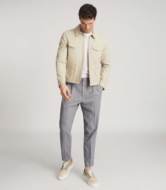Beige Canvas Low Top Sneakers Outfits For Men: You'll be surprised at how super easy it is for any guy to put together this off-duty outfit. Just a beige harrington jacket and grey chinos. Puzzled as to how to finish off? Introduce beige canvas low top sneakers to your ensemble to mix things up.
