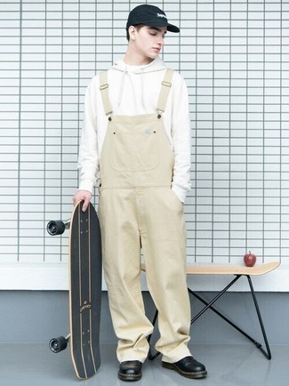 Overalls with Hoodie Outfits For Men: A hoodie and overalls are indispensable menswear pieces, without which no casual closet would be complete. Unimpressed with this ensemble? Introduce a pair of black leather derby shoes to spice things up.