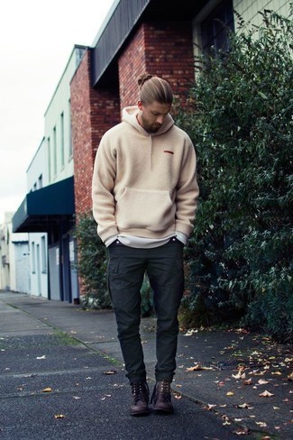 Beige Fleece Hoodie Outfits For Men: For a casual ensemble, wear a beige fleece hoodie and charcoal cargo pants — these items fit beautifully together. Feeling inventive today? Smarten up this outfit by finishing off with a pair of burgundy leather casual boots.