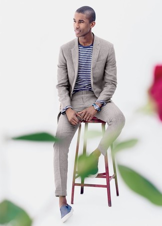 Navy Canvas Slip-on Sneakers Outfits For Men: This combination of a beige linen suit and a navy and white horizontal striped long sleeve t-shirt looks neat and instantly makes any gent look cool. Play down this ensemble by rounding off with navy canvas slip-on sneakers.