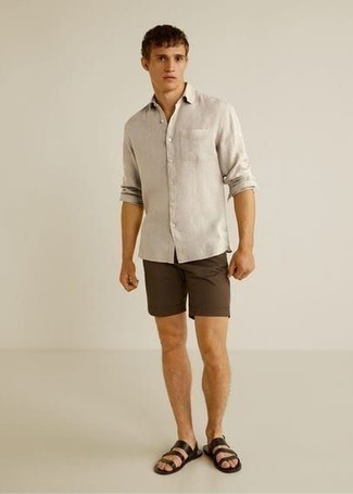 Dark Brown Leather Sandals Outfits For Men: Marrying a beige long sleeve shirt with dark brown shorts is a savvy pick for a casual look. To bring a mellow vibe to this outfit, add a pair of dark brown leather sandals to this look.