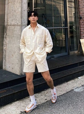White Shorts Outfits For Men: For a casual look with a modern twist, team a beige long sleeve shirt with white shorts. Here's how to tone it down: white and brown athletic shoes.
