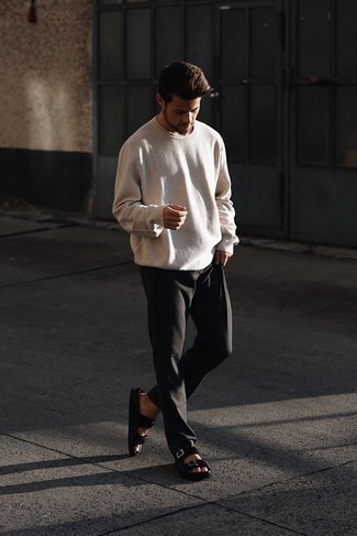 Tan Long Sleeve T-Shirt Outfits For Men: A tan long sleeve t-shirt and black chinos are indispensable menswear essentials to have in your casual box. For something more on the daring side to finish off your look, add black leather sandals to your ensemble.