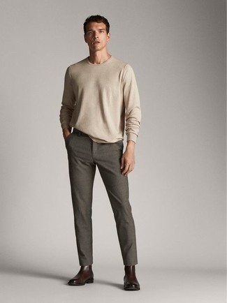 Beige Long Sleeve T-Shirt Outfits For Men: This pairing of a beige long sleeve t-shirt and charcoal chinos is hard proof that a simple casual outfit doesn't have to be boring. Want to break out of the mold? Then why not complete your outfit with a pair of dark brown leather chelsea boots?