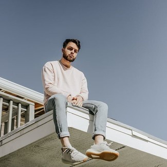Grey Jeans Outfits For Men: Up your laid-back look in a beige long sleeve t-shirt and grey jeans. Slip into a pair of grey athletic shoes to infuse a dose of stylish effortlessness into this outfit.